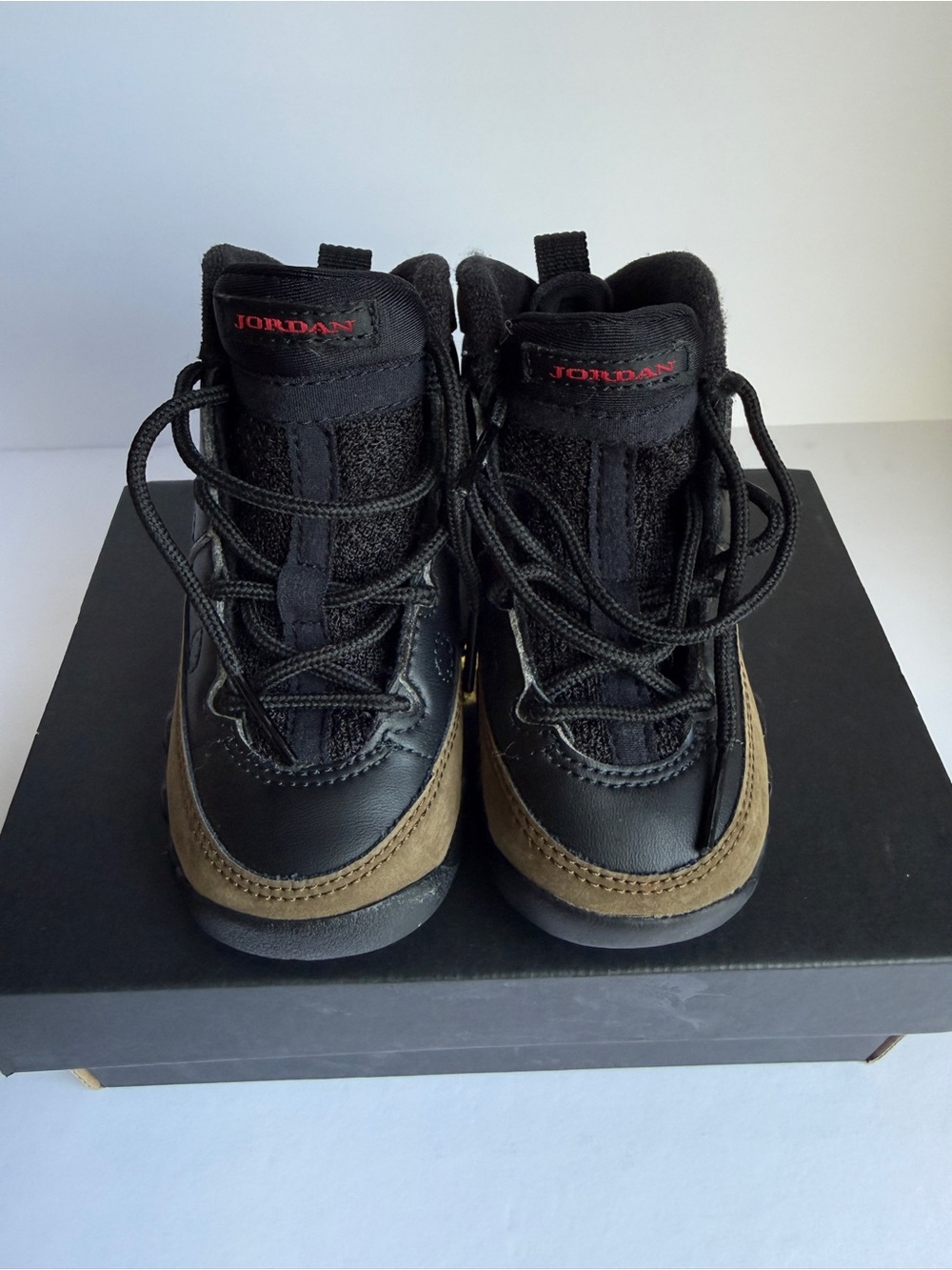 Jordan Kids Black and Brown High-Top Sneakers with Red Logo
